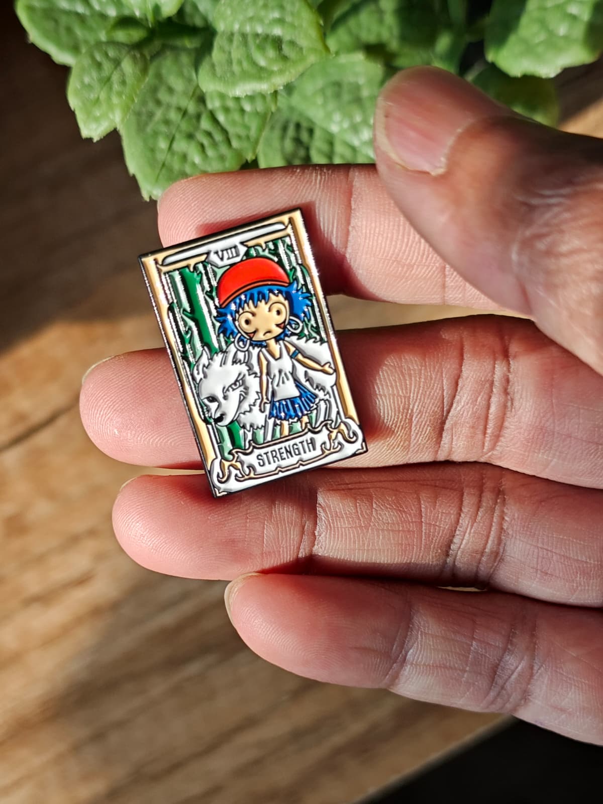 Princess Mononoke enamel pin featuring a "Strength" tarot card